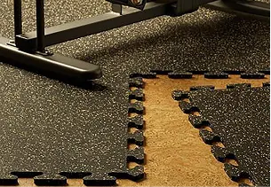 Interlocking rubber tile edges.