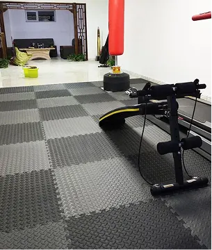 Grey interlocking gym mats.