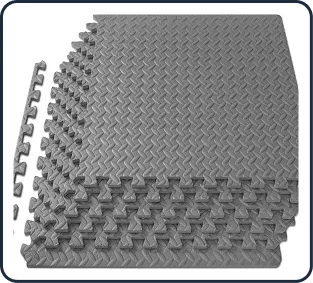 Grey textured gym mats stack.